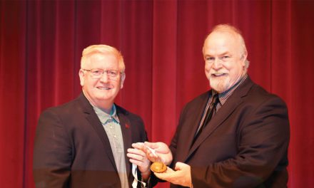 DR. RAY SCOTT CRAWFORD: BRINGING HOME THE GOLD