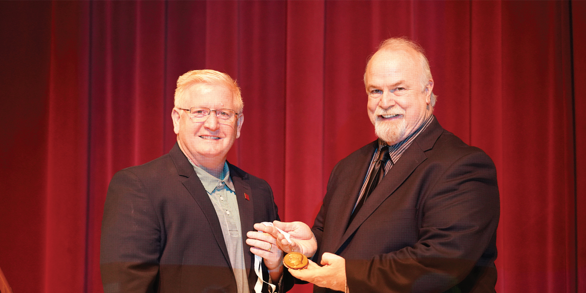 DR. RAY SCOTT CRAWFORD: BRINGING HOME THE GOLD